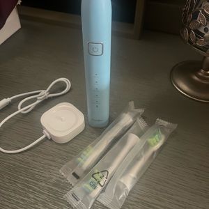 7AM2M Sonic Electric Toothbrush (comes with new, unopened brush heads)